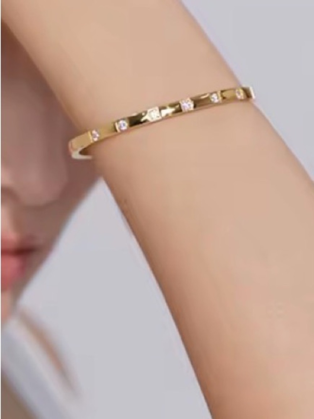 Gold PVD Plated Stainless Steel Bangle with Cubic Zirconia Accents - Picture 4 of 9